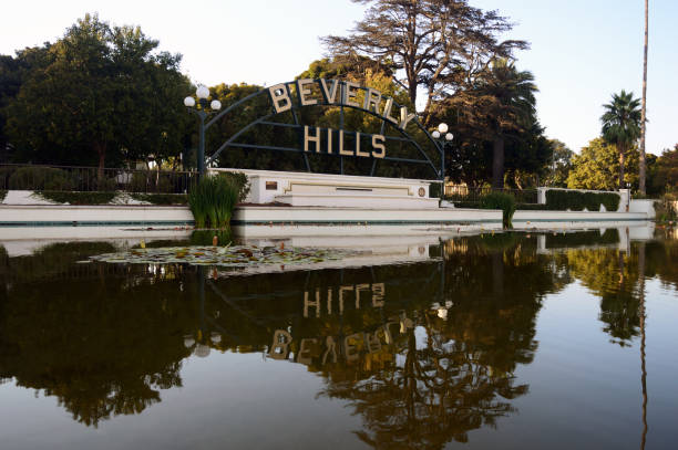 istock Beverly Hills Sign and it's reflection in water 689731526