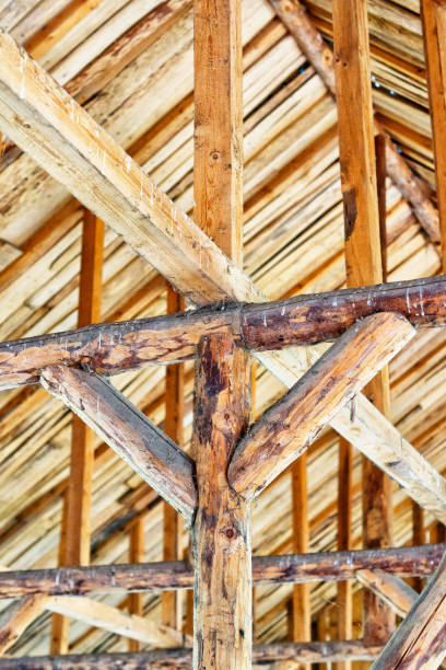 istock The ceiling and rafters in old wooden room 689737482