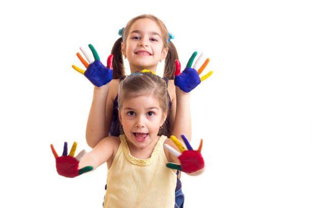 istock Little girls with colored hands 689746662