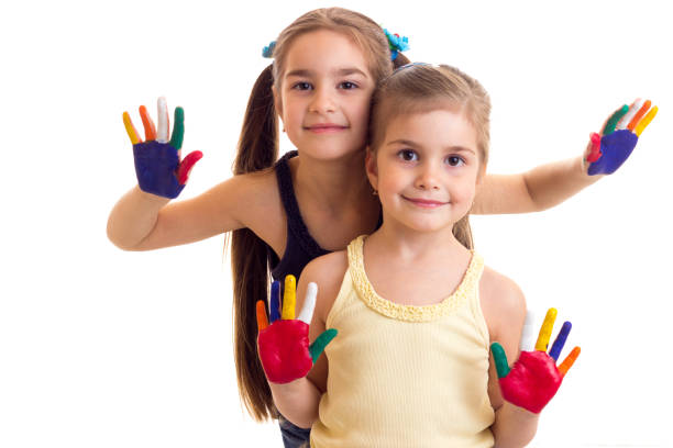 istock Little girls with colored hands 689746740