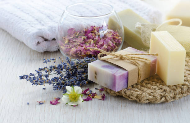 istock Handmade Soap with bath and spa accessories on marble background 689747006