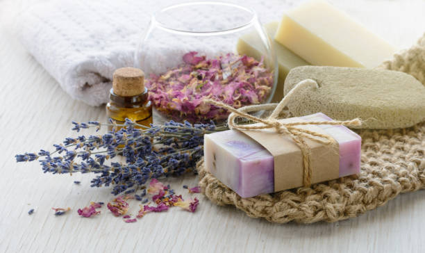 istock Handmade Soap with bath and spa accessories on marble background 689747134