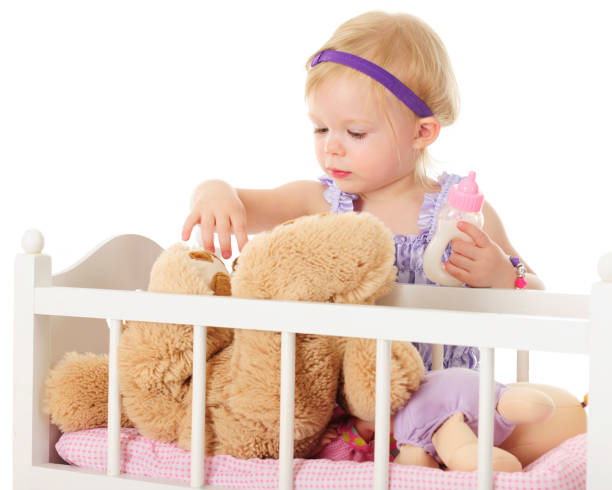 Putting Teddy and Dolly to Bed