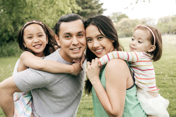 istock Happy family having fun outdoor 689759436