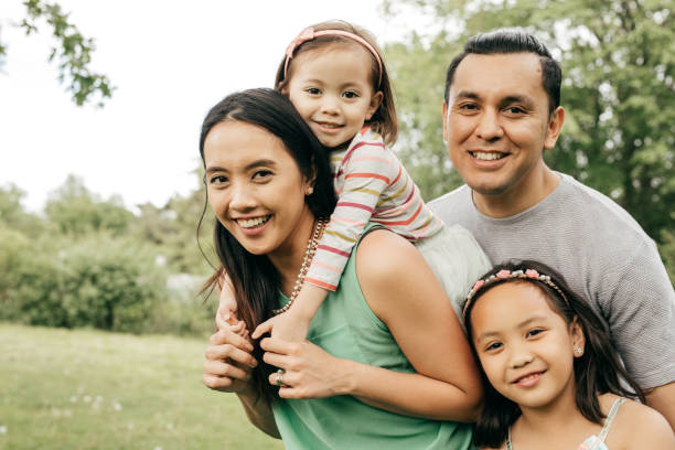 istock Happy family having fun outdoor 689759448