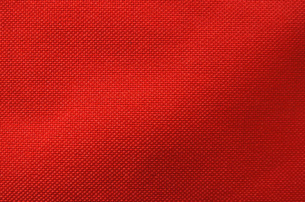 istock Texture of woven fabric in the red color 689765022