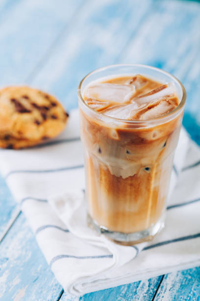 istock Iced latte on wooden table 689771738