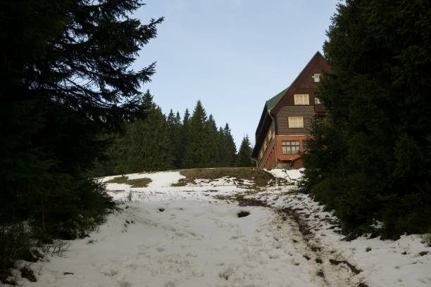 istock View to chalet and clouds on the hill. Slovakia 689772092