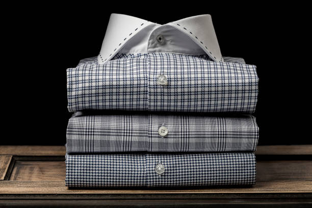 istock Close-up of Plaid Folded Men's Shirts 689775042