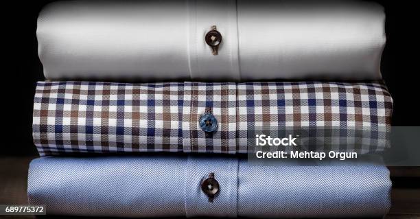 Closeup Of Folded Mens Shirts Stock Photo - Download Image Now - Menswear, Dry Cleaned, Luxury