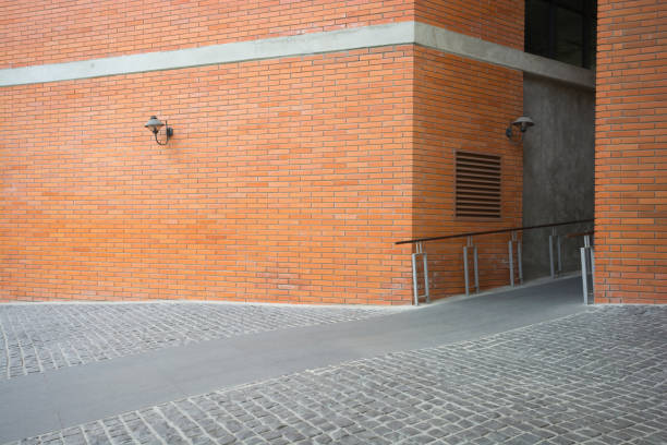 istock outdoor architecture with vibrant red brick wall,walkway in school. 689781720