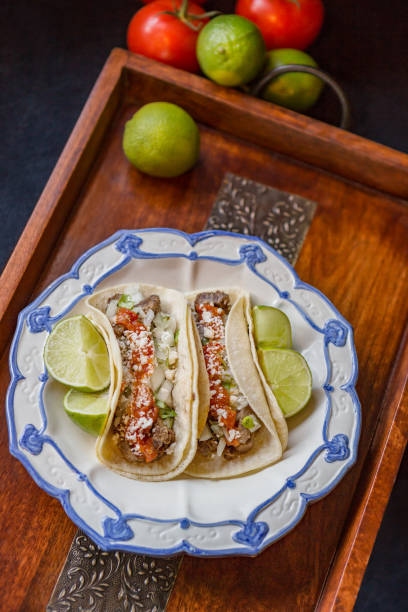 istock Carne Asada Tacos on a festive blue and white plate 689784252