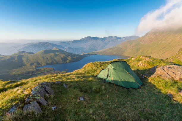 istock Pitched Wild Camping Tent In Lake District. 689789674