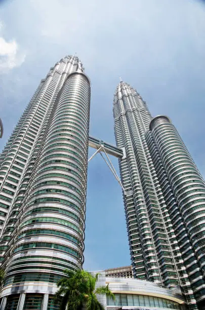 KUALA-LUMPUR, MALAYSIA - MAY 18: Twin towers Petronas and sky bridge at Mayl 18, 2013, Kuala Lumpur, Malaysia.