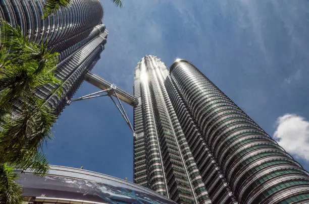 KUALA-LUMPUR, MALAYSIA - MAY 18: Twin towers Petronas and sky bridge at Mayl 18, 2013, Kuala Lumpur, Malaysia.