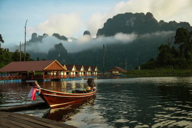 istock Floating houses and long tail boats at Chieou Laan lake 689793314