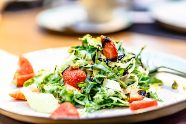 istock Salad of arugula and strawberries with balsamic vinegar 689802038
