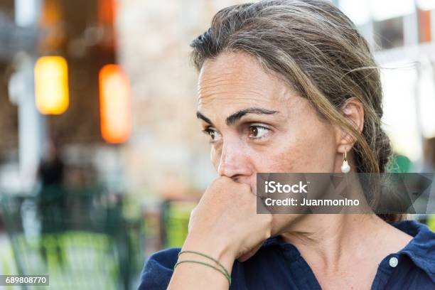 Concerned Serious Mature Woman Stock Photo - Download Image Now - Women, One Woman Only, Mature Women