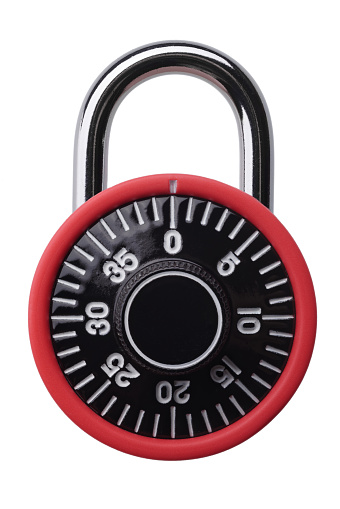 Isolated objects: small red combination padlock, isolated on white background