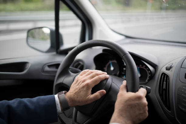 istock Businessman Driving Car 689814504