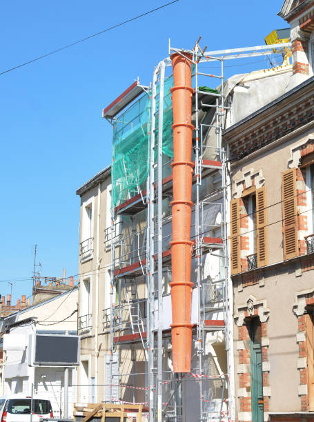 istock Construction scaffolding of a building Renovation. 689819204