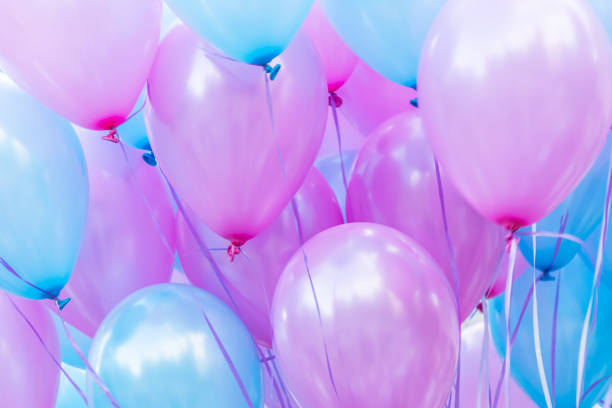 many balloons on a string, close-up abstract background stock photo