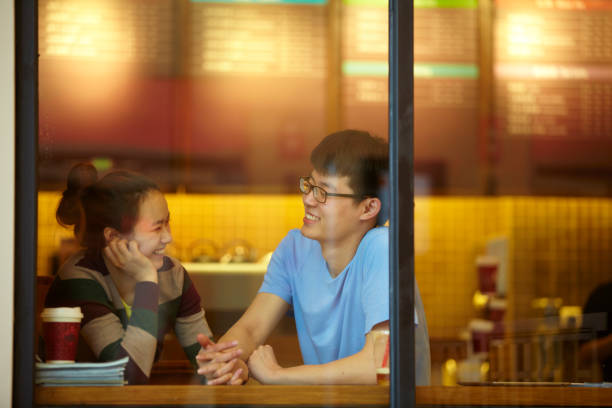 istock Young Asian people Dating in Cafe 689842260