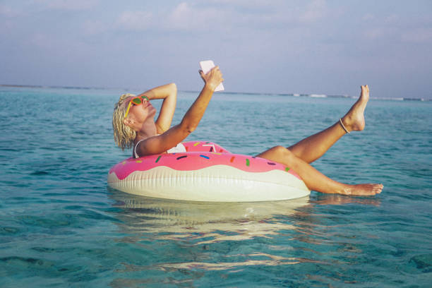 istock Selfie time and floating, Maldives 689842508