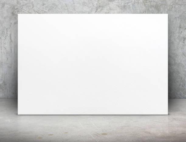 istock Blank white paper poster canvas at grunge concrete room,Mock up template for adding your content or design,Business presentation 689853440