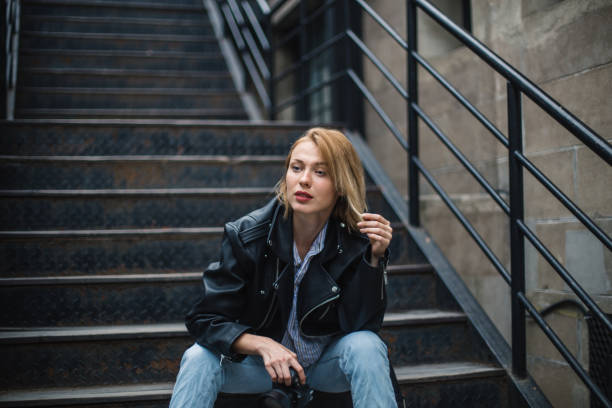 istock Cute girl photographer relaxing 689857176