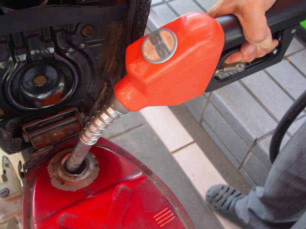 istock fill up fuel at gas station 689860828