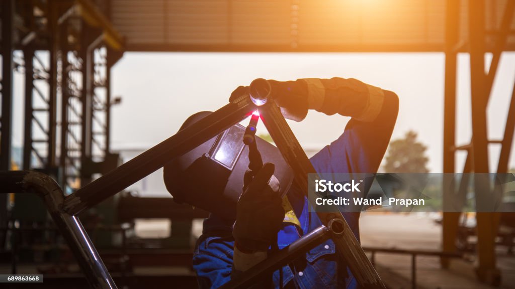 Pipe welding on the pipeline construction Crude Oil Stock Photo