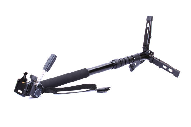 istock Black tripod over isolated on white background 689864036