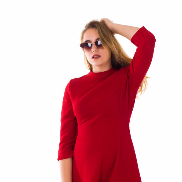 istock Young pretty woman, sunglasses, white background 689867428