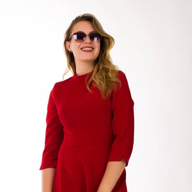 istock Young pretty woman, sunglasses, white background 689867454