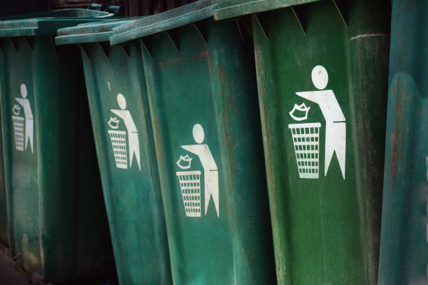istock close-up of a green bin. please litter into bins symbol. 689875574