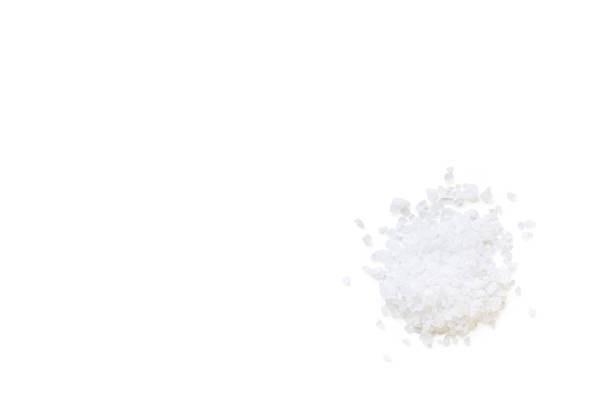istock sea salt isolated on a white background 689881568
