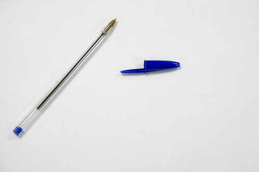 blue pen on white background