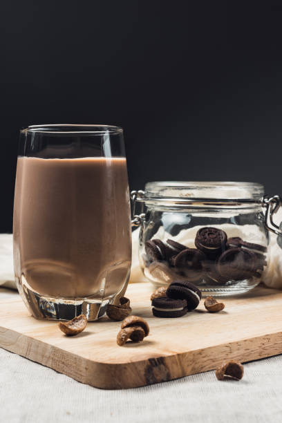 istock Chocolate milk with jar of cookies 689881864