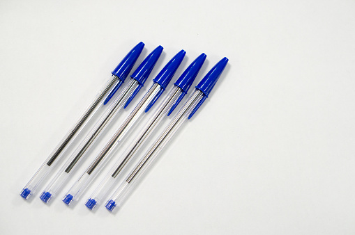 blue pen on white background
