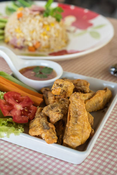 istock barbecue buffalo chicken wings with celery sticks and ranch sauce 689883900