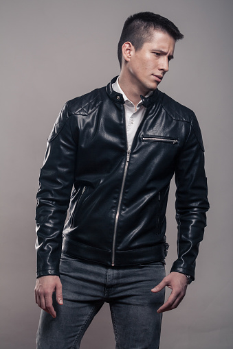 Young Man Looking Tense Sideways Leather Jacket Stock Photo - Download ...