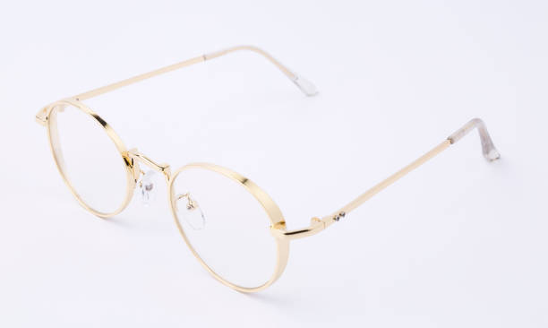 istock classic gold round glasses on white background 689893322