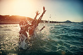 istock Children splashing in summer sea 689893578