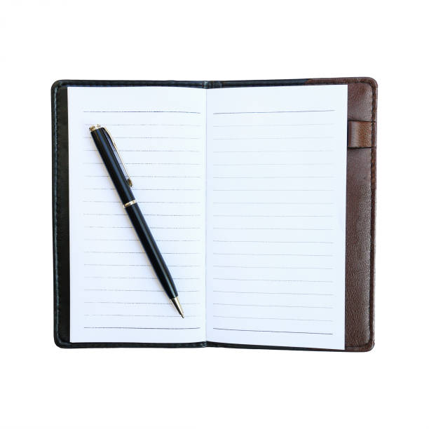 istock black business pen on notebook with leather case isolated on white 689904388