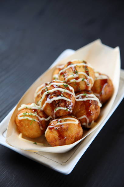 istock Japanese octopus balls TAKOYAKI boat 689910242