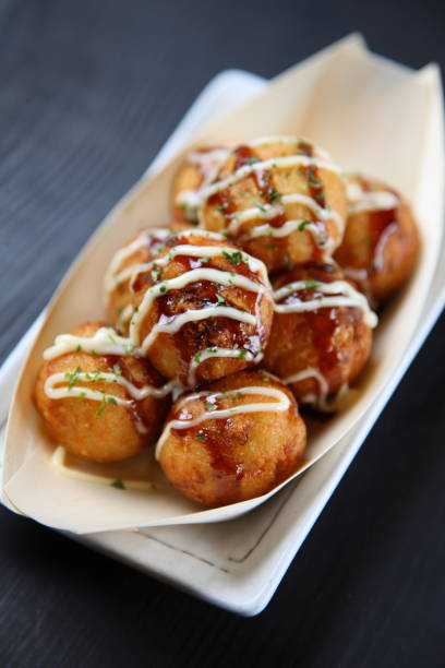 istock Japanese octopus balls TAKOYAKI boat 689911336