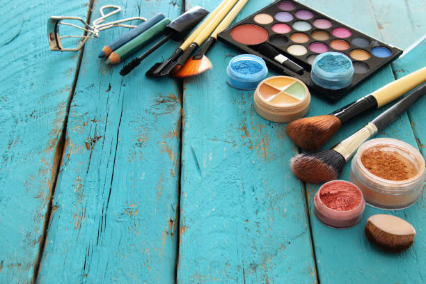 istock makeup cosmetics beauty tools and brushes on wooden background 689915234