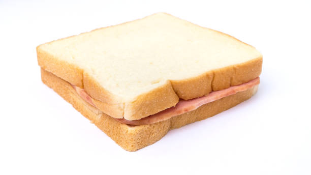 ハムのサンドイッチと白パンのスライス - toast fast food plate food ストックフォトと画像
