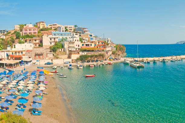 istock beach and small port on sunny day panorama 689928882